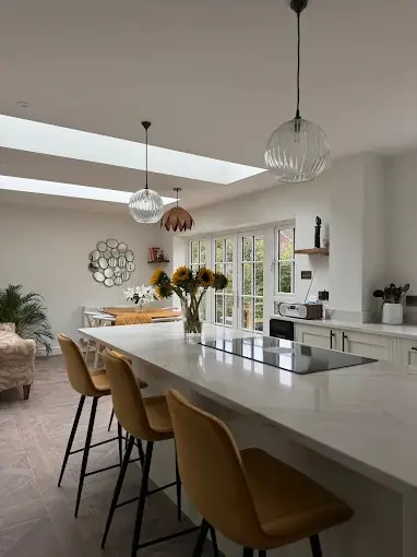 An open-plan kitchen diner decorated by our Swansea painters and decorators.